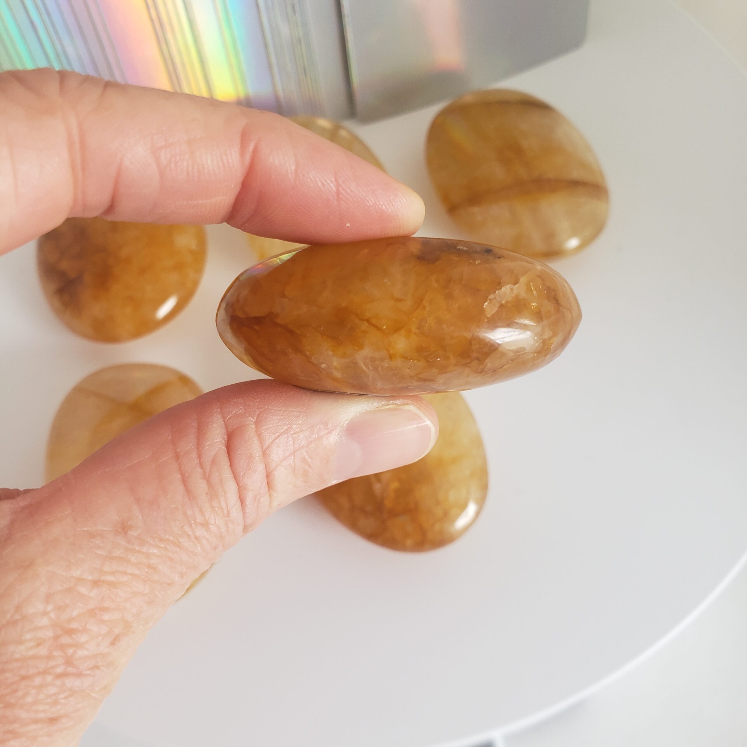 golden healer quartz palm s