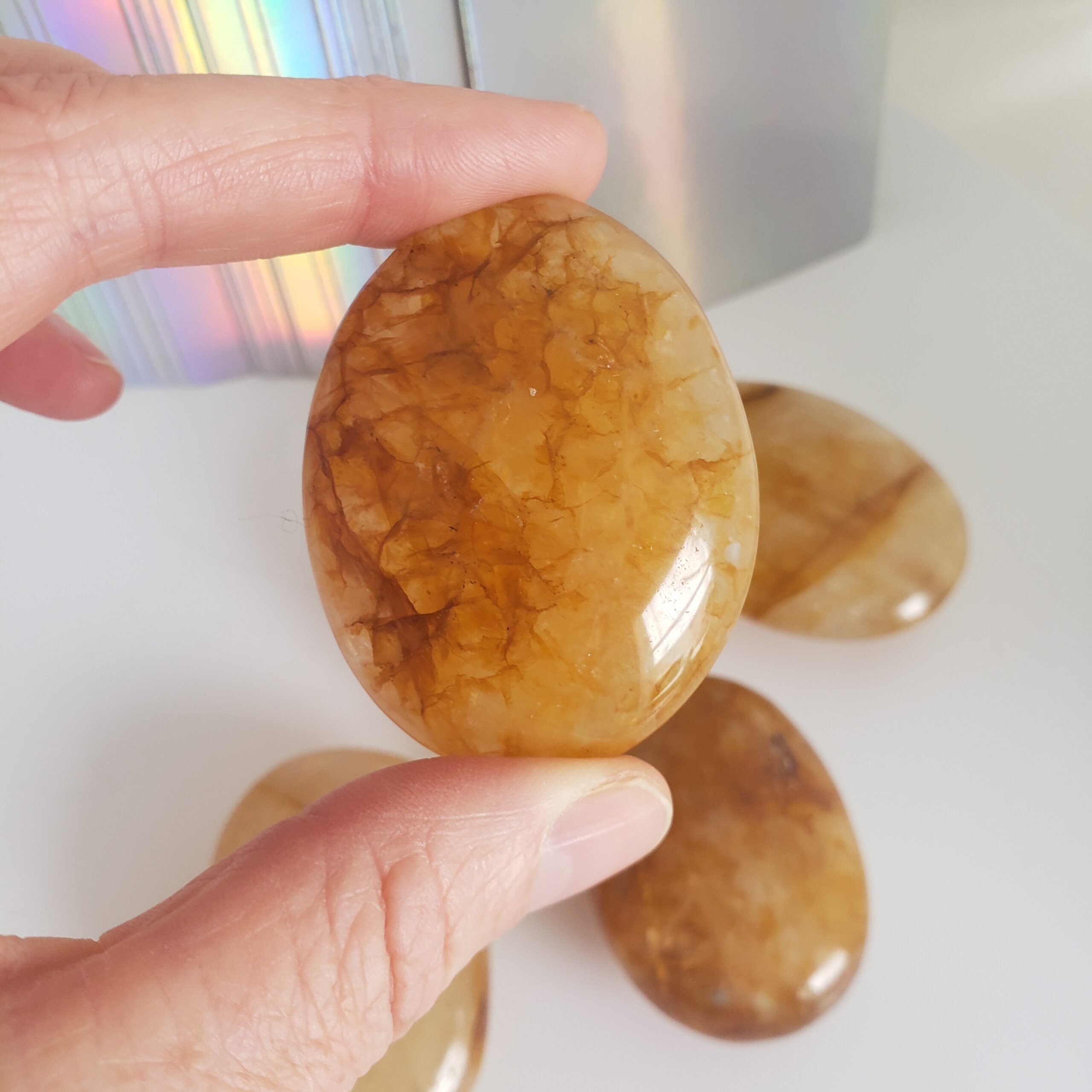 golden healer quartz palm s