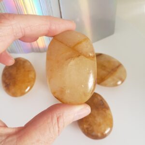 golden healer quartz palm s