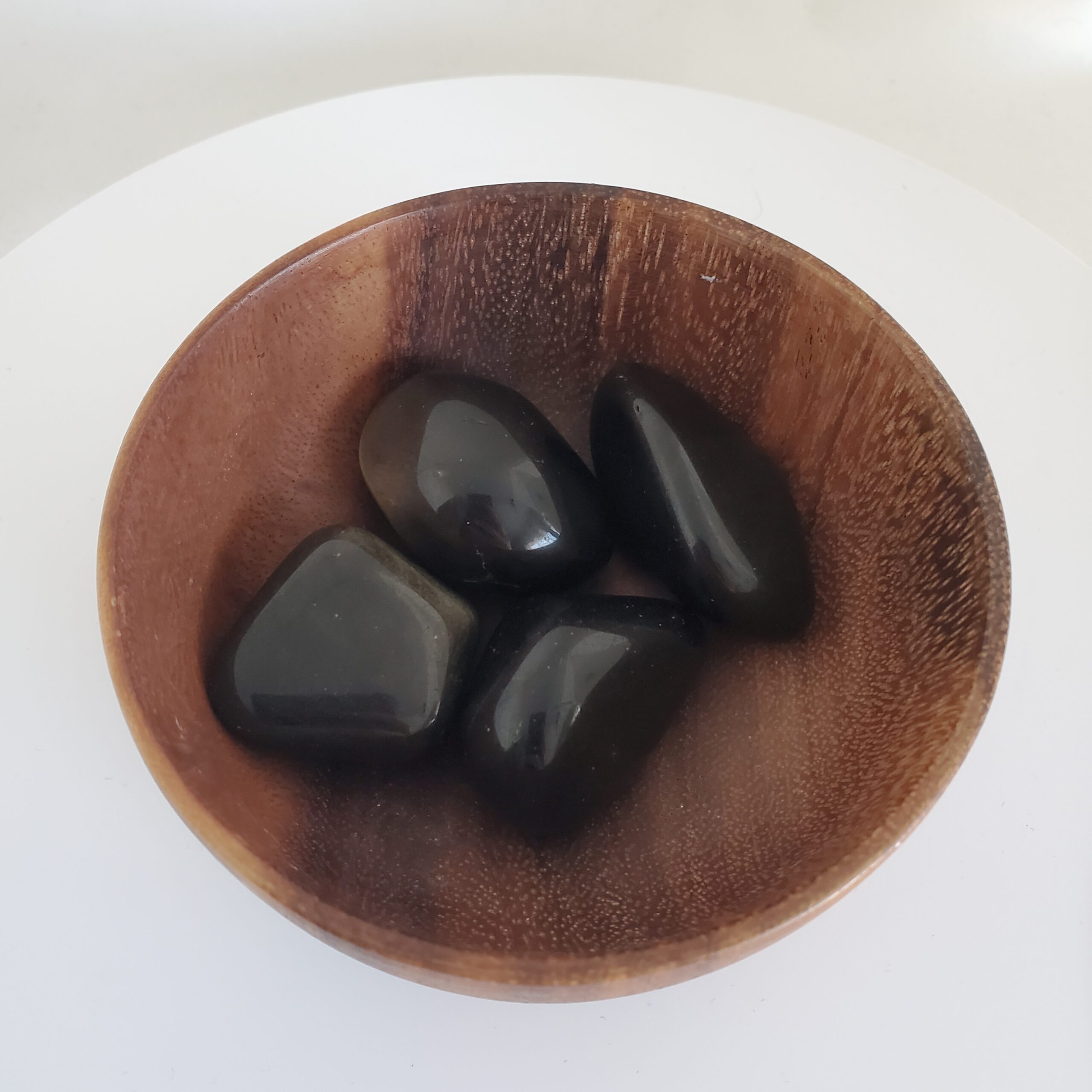 onyx black gold tumbled