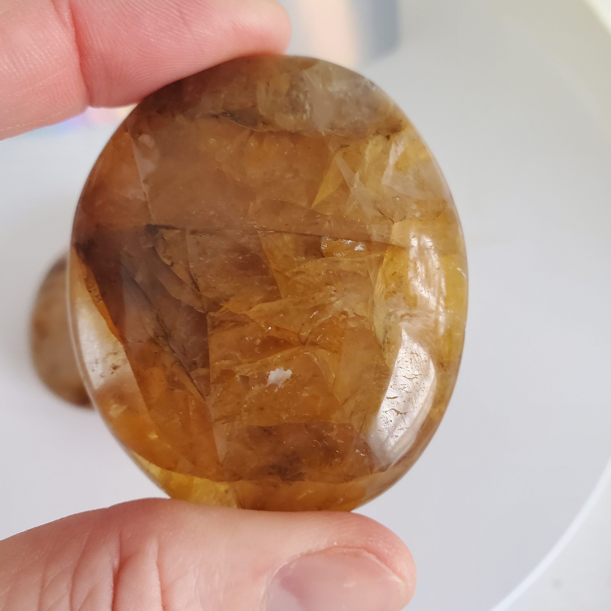 golden healer palm stone